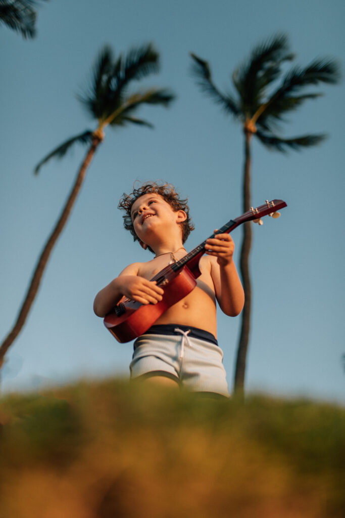 hawaii ukulele boy with palm trees