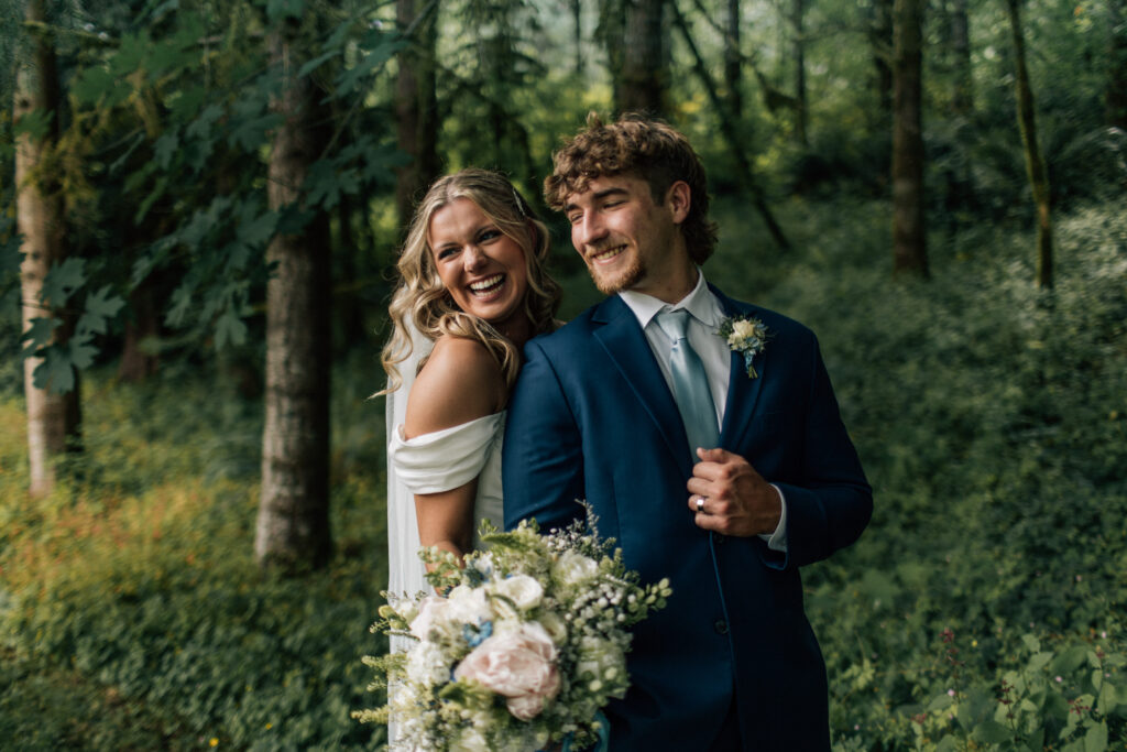 joyful couple in the woods at 3C's farm