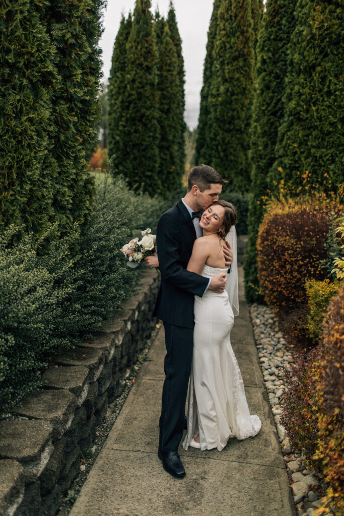 a couple embracing at their Lord Hill Farms Wedding