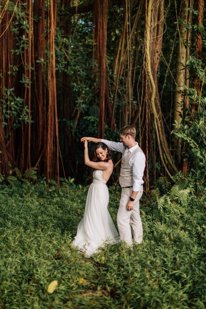 couple dancing in banyan tree on oahu