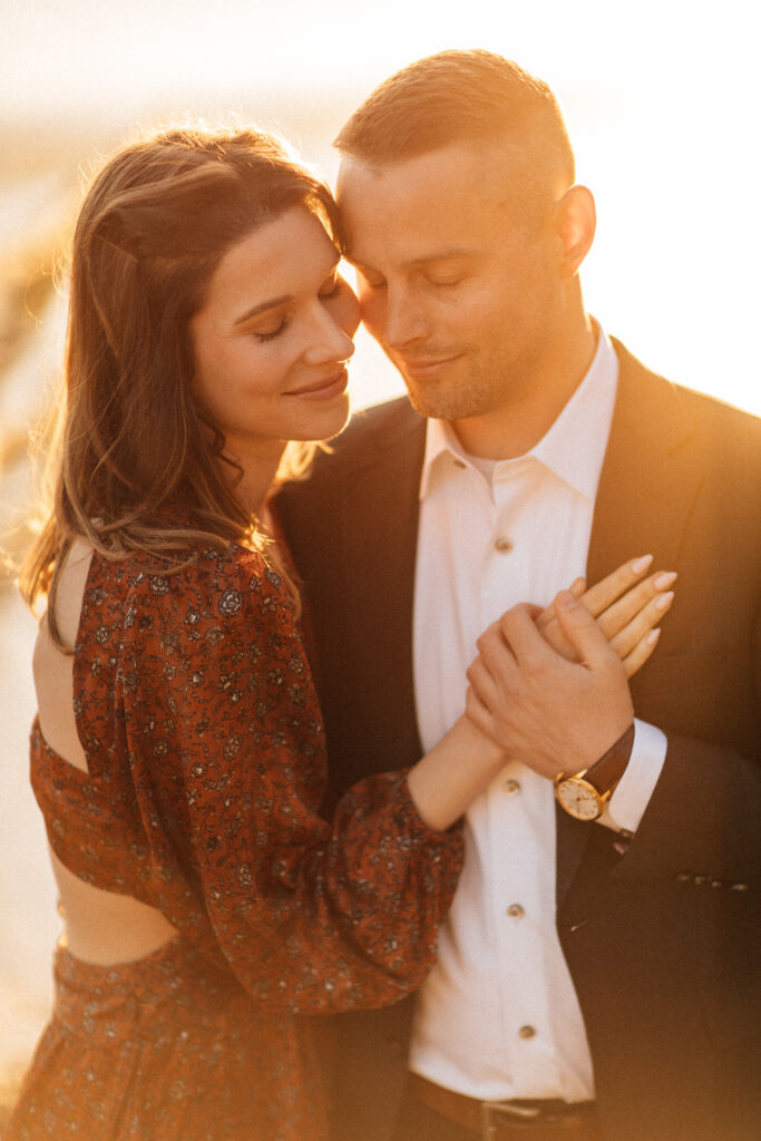 glowing warm golden hour engagement photo
